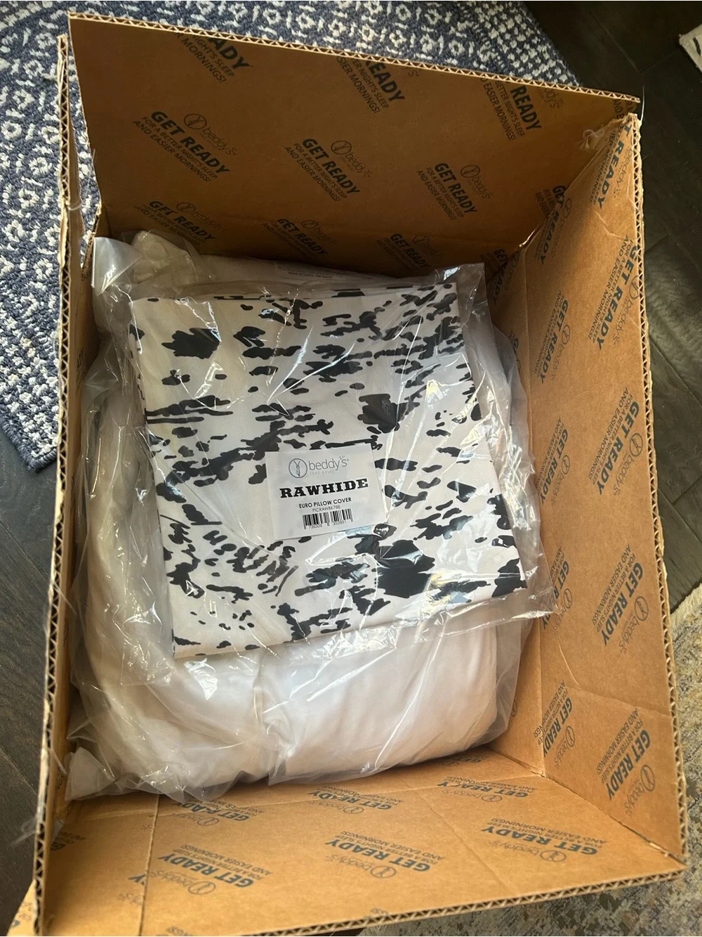 Beddy’s New Cow ‘Rawhide’ print pillow case & down insert